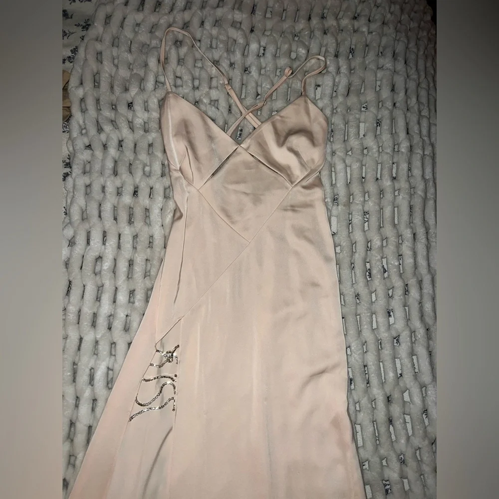 sleeveless gown with a strappy open back and embellished side slit - Picture 2 of 3